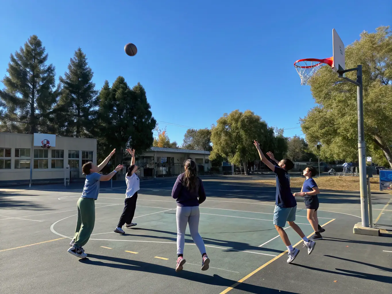 Students engaging in a group discussion after a sports event, demonstrating improved communication and social interaction skills.